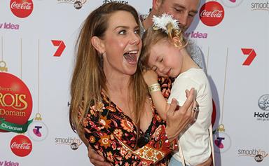 Getting into the holiday spirit! Kate Ritchie attends Carols in the Domain with Stuart Webb and Mae
