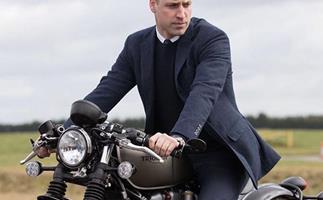 Born to be wild: Prince William is the ultimate cool dad atop a motorcycle