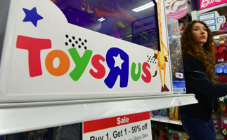 Customer shopping in Toys R Us store