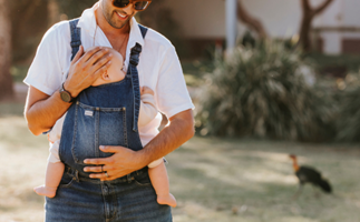 Baby-wearing dungarees for dads are here and we're not mad about it
