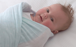 Swaddle or sleeping bag for baby?