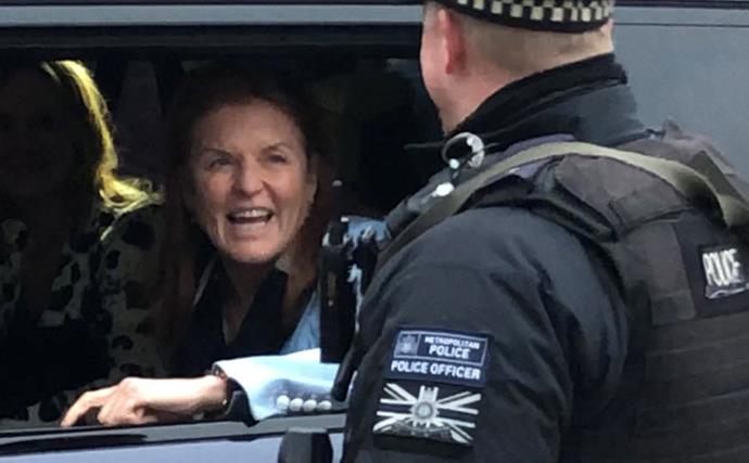 Sarah Ferguson is all smiles as she heads to Buckingham Palace for crisis talks