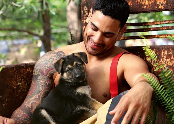 14 very visual reasons why you need a shirtless firefighter holding a puppy in your life