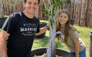 Bindi Irwin and new husband Chandler Powell reveal the wedding gift they received from Russell Crowe