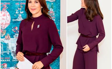 Crown Princess Mary glows in plush purple as she reveals the iconic annual Christmas stamp
