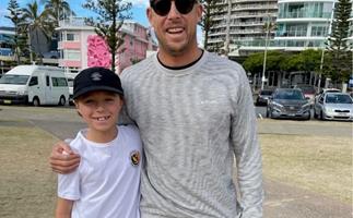 REAL LIFE: How Aussie surfing legend Mick Fanning brought some Christmas magic to one brave boy and his family