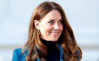 Catherine, Duchess of Cambridge steps out for her first royal engagement of 2022 in a regal petrol blue coat
