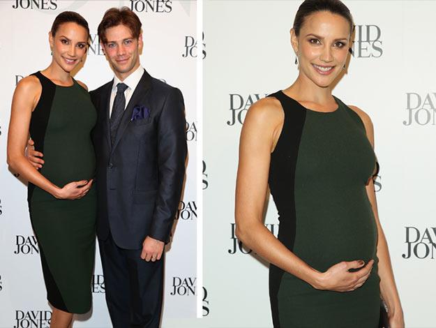 The expecting couple at the David Jones spring/summer 2013 Collection Launch, seven months along. (Image: Getty)