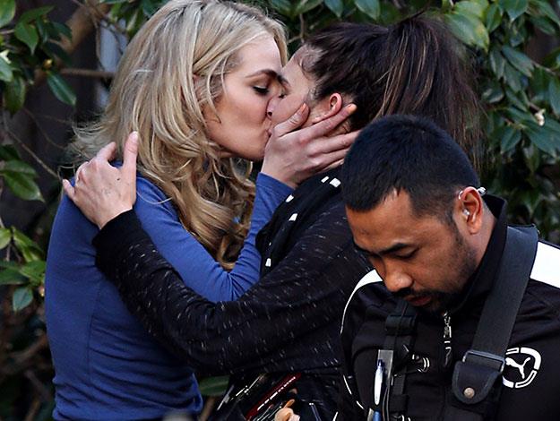 Jess didn't care who was watching as she locked lips on set!