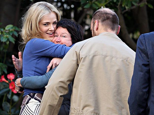 It looks like there were plenty of crew members targeted by Jess's affections on Friday as she clamped another colleague in a bear-hug!