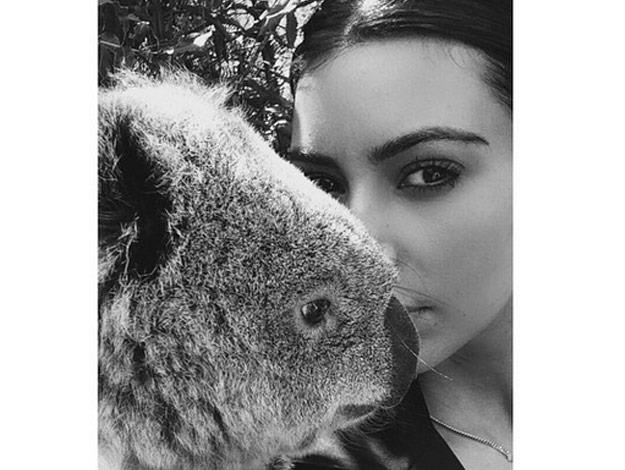The Keeping Up With the Kardashian star snuggled up with a super-cute Koala and even managed to pose for a glamorous selfie with the warm and fuzzy creature.
