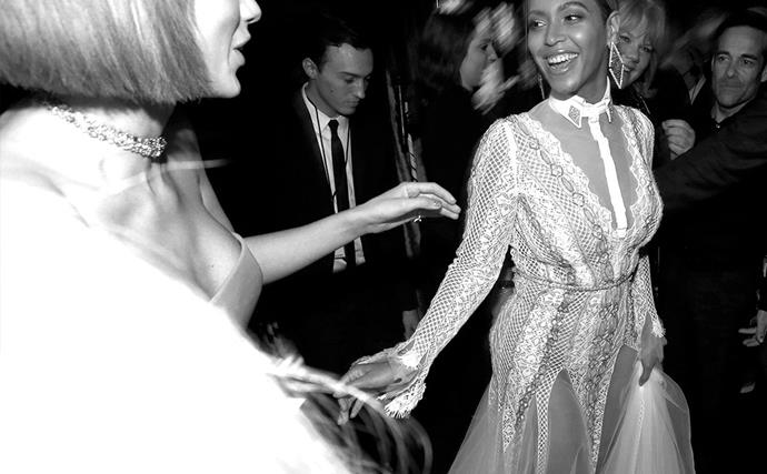 Beyonce and Taylor Swift share a dreamy moment at the 58th Annual Grammy Awards. 