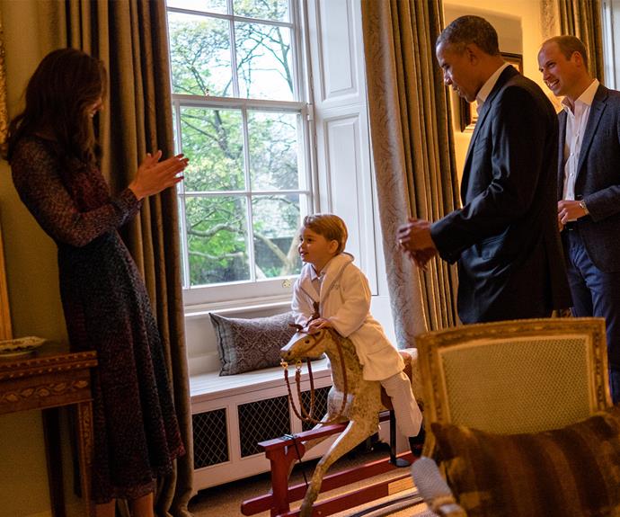 Look at me go! George showed off his rocking horse skills as Duchess Catherine proudly clapped him on. The toy was given to George from The Obamas when he was born.