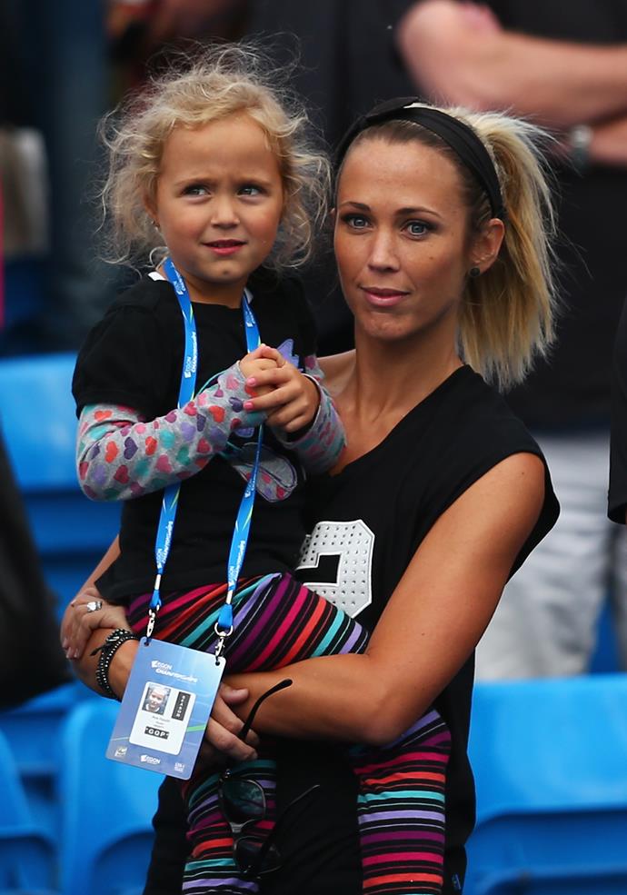 Bec Hewitt (R) and daughter Ava watch Lleyton Hewitt of Australia in his men's singles first round match against Kevin Anderson of South Africa during day one of the Aegon Championships at Queen's Club on June 15, 2015 in London, England. (Photo by Clive Brunskill/Getty Images)