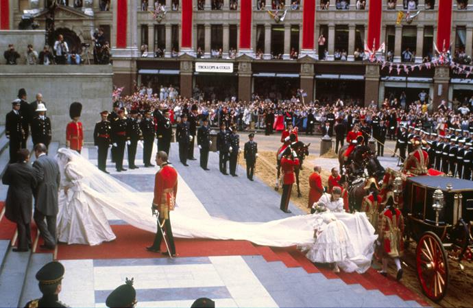 Lady Diana was delivered to the Abbey with her father in a glass carriage. Her enormous 25-foot train barely fit inside.