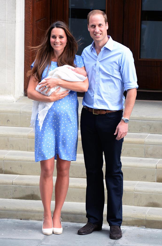Gently cradling a tiny Prince George.
