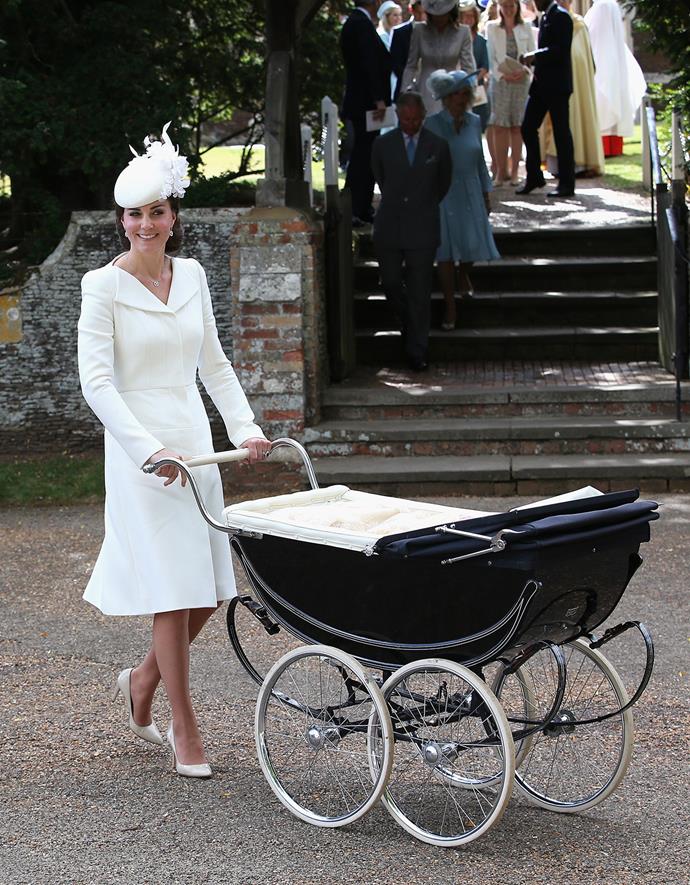 Kate pushes Princess Charlotte of Cambridge in her pram they leave the Church of St Mary Magdalene on the Sandringham Estate after the Christening.