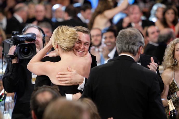 Kate Winslet give Leonardo DiCaprio a warm embrace after she wins the Best Actress Oscar for Revolutionary Road at the 66th Annual Golden Globe Awards in 2009.