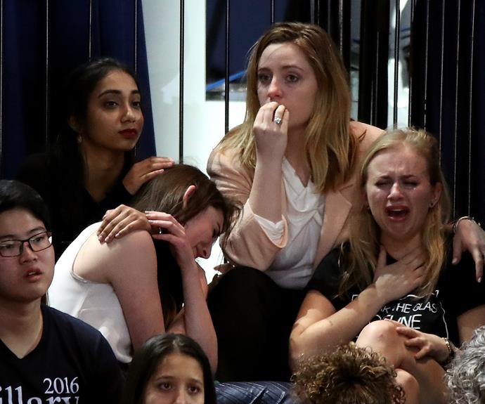 Devastated Hillary Clinton supporters watch the election results roll in New York City.