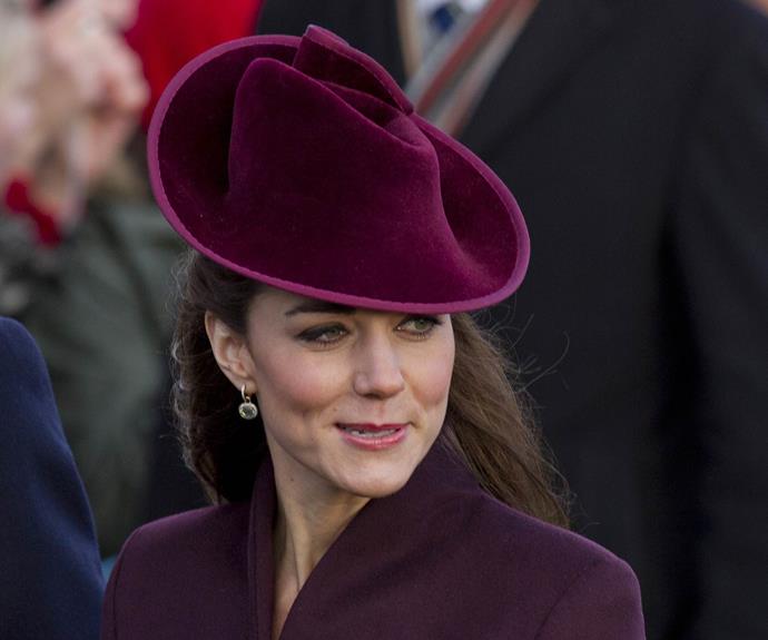 Kate looked stunning in a burgundy coat and matching hat.