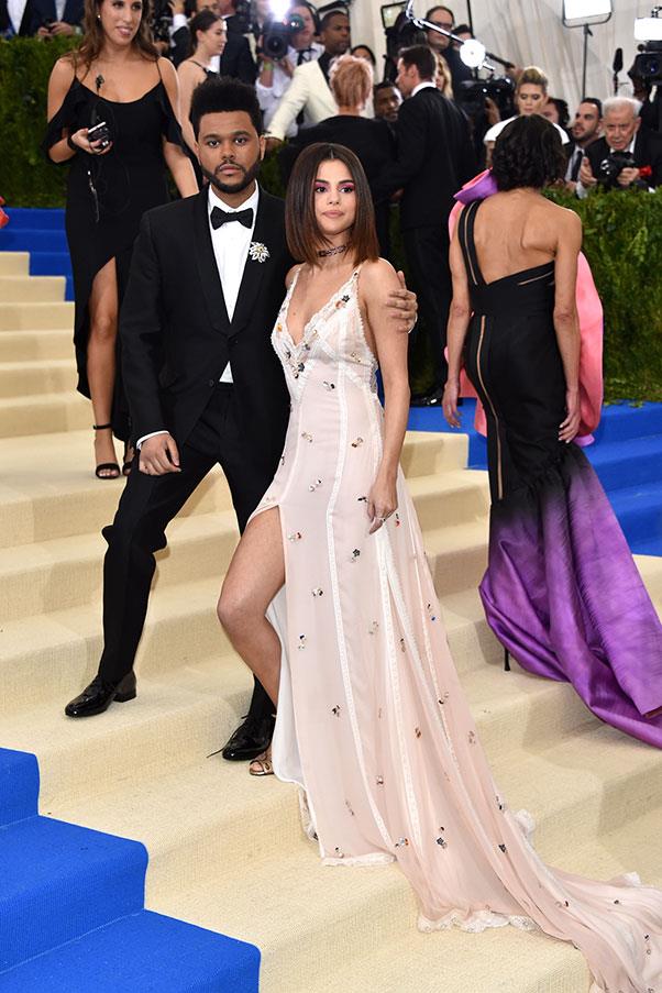 Selena Gomez, in Coach, and The Weeknd.