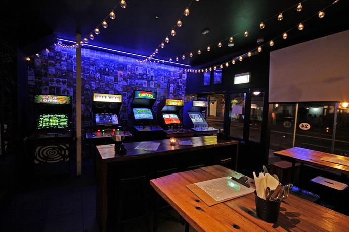 **For a retro games night… 1989**
<br>
<br>
Sydney's first arcade bar and café, located on King Street in Newtown, is the go-to spot if you want to hang with your competitive pals and smash out a game (or five) of Space Invaders.