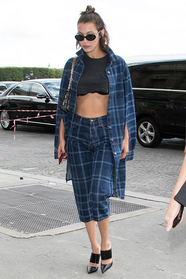 Bella stepped out at Paris couture fashion week wearing the tried-and-tested check formula, this time in an indigo hue with black accessories.