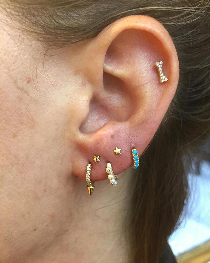 This lobe curation features two high lobe piercings.
<br><br>
Image: [@kevinthepiercer](https://www.instagram.com/p/BX4uwxfgZck/?taken-by=kevinthepiercer)