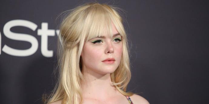 **FEELING GREEN**
<br><br>
**Who's wearing it:** Elle Fanning working lime green eyeshadow with a bold black cat eye means pop art eye make-up is officially back on the fashion agenda. Neutral smokey eye who?