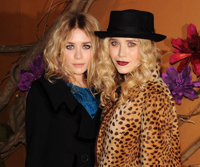 Both Mary Kate and Ashley channel Kate Moss with tousled hair, a wine lip and a heavy dark eye.