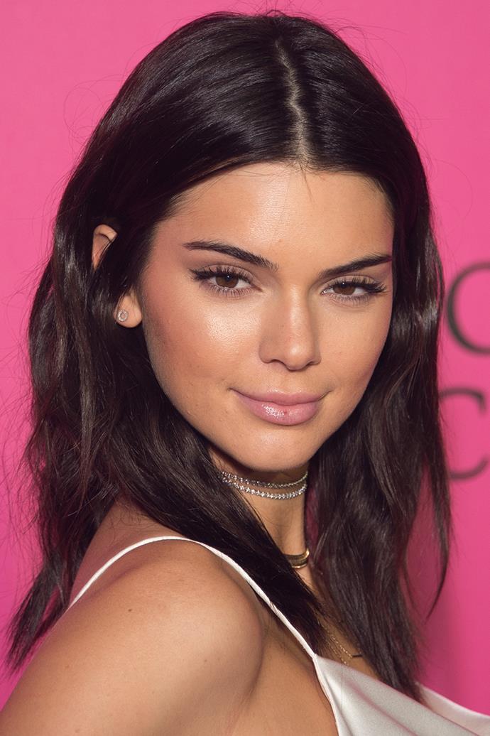 Kendall Jenner's look at the 2016 Victoria's Secret Fashion Show after party consisted of lightly contoured cheeks, a winged eye and pale pink lips with a satin finish.