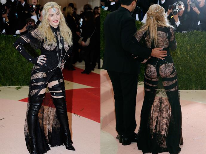 **2016: MADONNA in Givenchy by Riccardo Tisci**
<br><br>
The Queen of Pop has spawned many a fashion frenzy throughout her lengthy career, and her 2016 Givenchy piece was understandably Madge personified. 
<br><br>
Her leather-and-lace Givenchy alien-esque extravaganza at the 2016 Met harkened back to her iconic *Erotica* era—and proved that, even when you're pushing 60, not giving a *f-ck* truly knows no age.