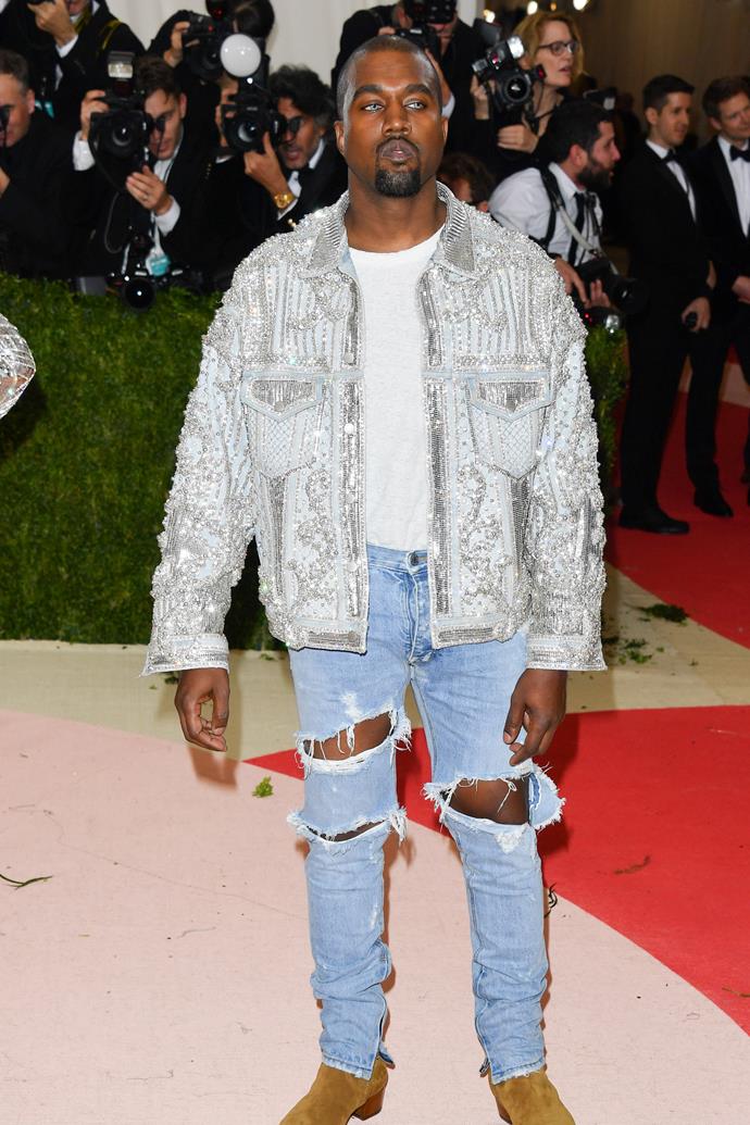 **2016: KANYE WEST in Balmain**
<br><br>
Long before his perpetual Twitter drama and #MAGA rants, Yeezus channeled his inner cyborg at the 2016 gala—in ripped jeans and a plain white tee, no less. 
<br><br>
Aside from his obvious disobeying of the black-tie theme (different rules apply to Kanye), his mildly terrifying eye contacts stole the show; and, when quizzed on them by a [red-carpet reporter](https://www.eonline.com/au/news/761722/kanye-west-describes-his-met-gala-2016-look-in-one-word|target="_blank"|rel="nofollow"), he simply responded "Vibes", before turning on his heel and sauntering away. 
<br><br>
HUGE mood.