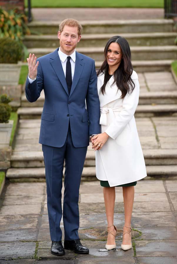 Announcing her engagement to Prince Harry, wearing a coat by Line the Label, Aquazurra heels and a dress by Parosh, November 2017.