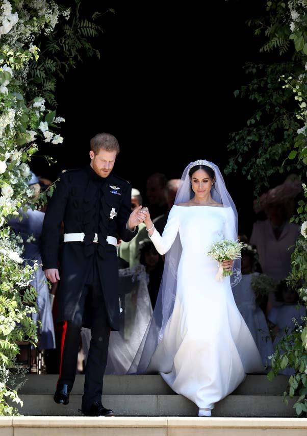 In Givenchy at her wedding to Prince Harry, May 2018.