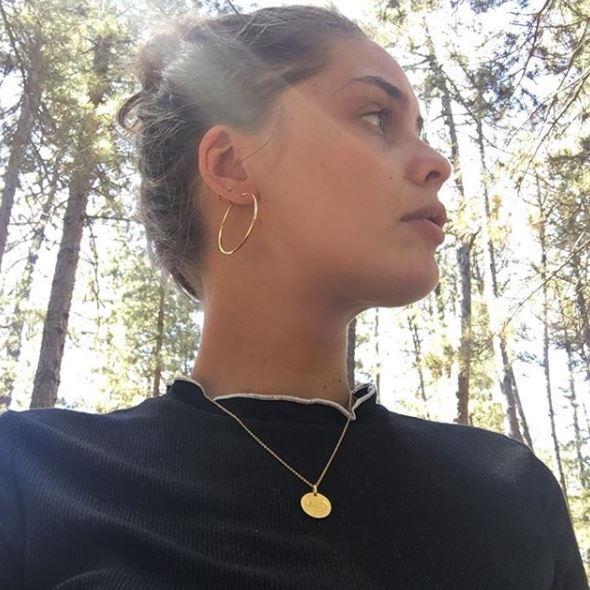 **Mid-sized gold hoop earrings**

Because you can never own too many hoops (they're a surprise classic). 

(Photo: Instagram/Marie-Ange Casta)