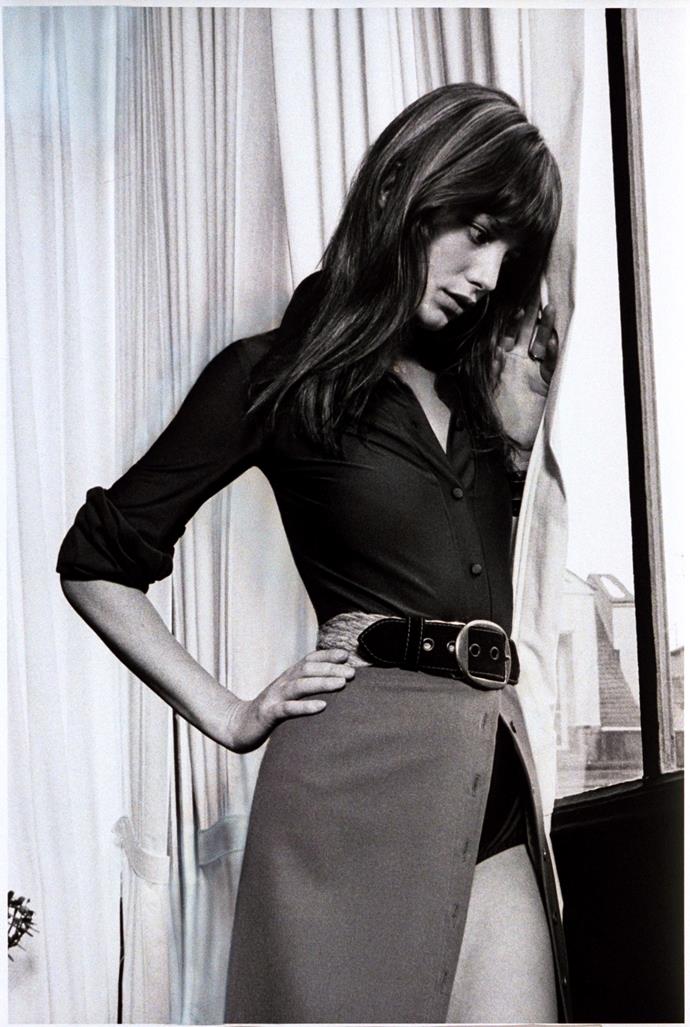 Posing in a belted skirt and fitted shirt in 1971.