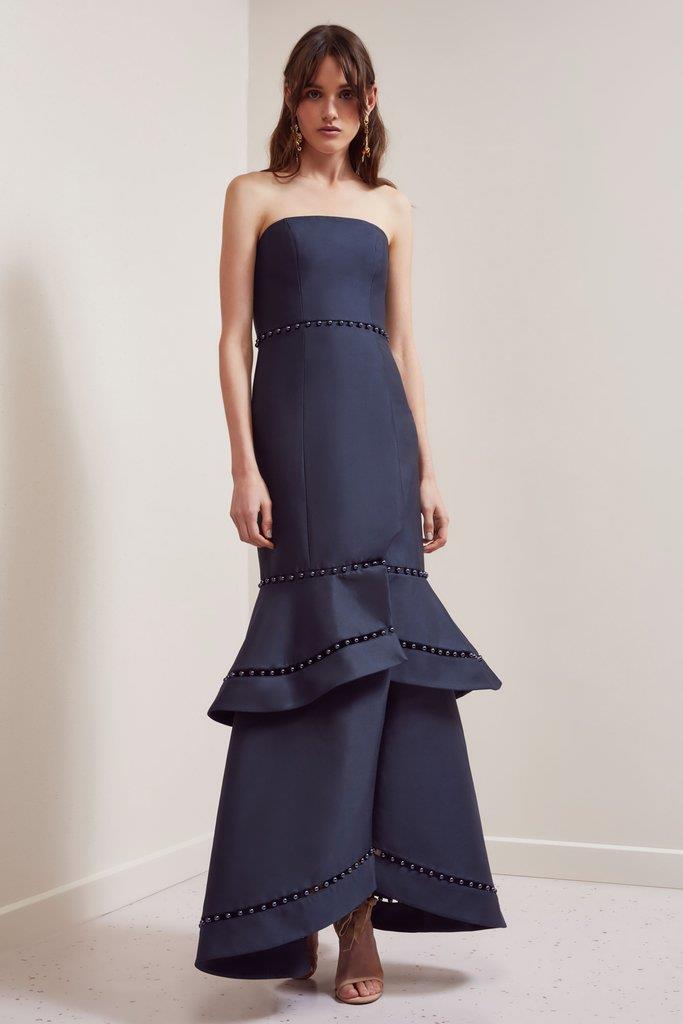 'Sweet Life' gown by Keepsake, $329.95 at [BNKR](https://fashionbunker.com/sweet-life-gown-navy|target="_blank"|rel="nofollow").