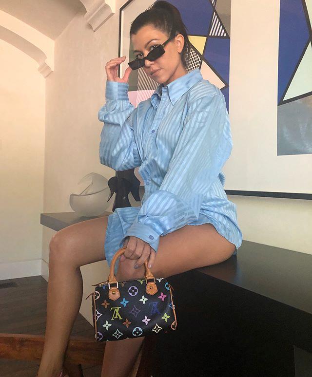 ***Louis Vuitton Murakami Multi-Colour: Now***
<br><br>
Pictured is [Kourtney Kardashian](https://www.elle.com.au/celebrity/kourtney-kardashian-younes-bendjima-split-18215|target="_blank") sporting a Murakami mini tote, proving that the Kardashian-Jenners have the ability to revive basically any 2000's trend. 
<br><br>
*Image: [Instagram](https://www.instagram.com/p/BjjDPguBJiV/?taken-by=kourtneykardash|target="_blank")*