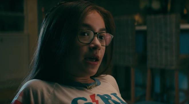 **Lara Jean's little sister, Kitty, wore a necklace that says 'feminist' throughout the film.**
<br><br>
Whether she's calling her dad "Dr. Man", or waxing lyrical about "The Goddess within", it's clear Kitty's a proud feminist. And what better way to say it than with a custom detailed necklace à la Carrie Bradshaw?