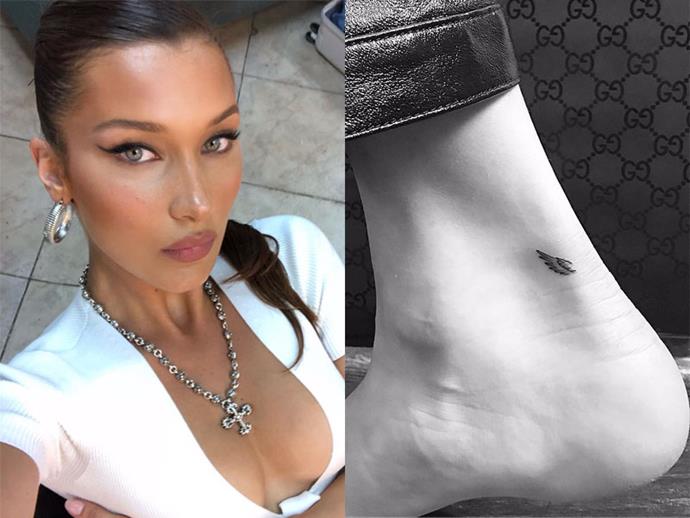 **BELLA HADID**
<br><br>
To commemorate her first-ever Victoria's Secret Fashion Show, Hadid tattooed a wing on each of her ankles.