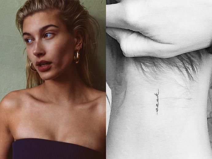 **HAILEY BIEBER**
<br><br>
The model has also had the word 'seek' inked in cursive writing on the back of her neck.