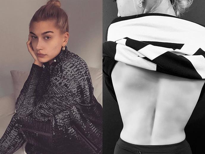 **HAILEY BIEBER**
<br><br>
In yet another instance of dainty tattoos on Hailey Baldwin's body, the model has the word 'unseen' inked along a small length of her spine. Tattoo artist, Jonboy, accompanied the above photo of her ink with the caption '2 Corinthians 4:18', a bible reference.