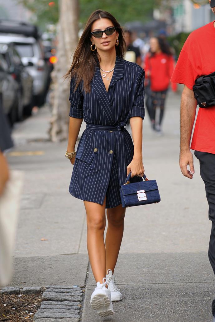 Wearing a pinstripe navy LPA blazer dress and AMI sneakers in New York City, September 2018.