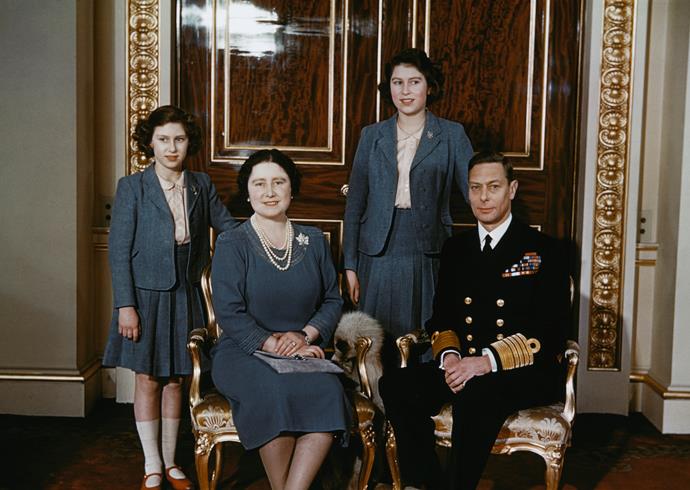 Princess Elizabeth, the Queen Mother, Princess Margaret and King George VI all in blue.