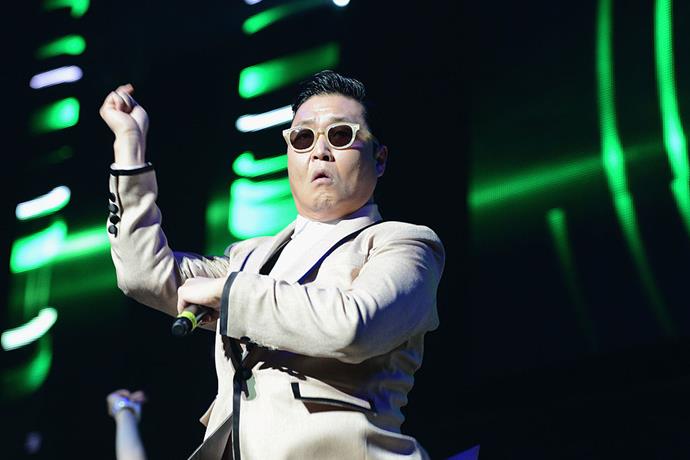 Psy sings a line in Korean