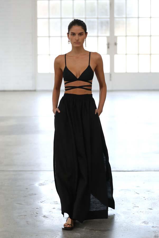 **Cut out for it:** Eveningwear was nonchalant and sexy—all black, with risque cut-outs for added va-va-voom factor. 
<br><br> Matteau Resort '20