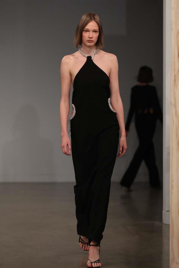 **Cut out for it:** Eveningwear was nonchalant and sexy—all black, with risque cut-outs for added va-va-voom factor. 
<br><br> Christopher Esber Resort '20