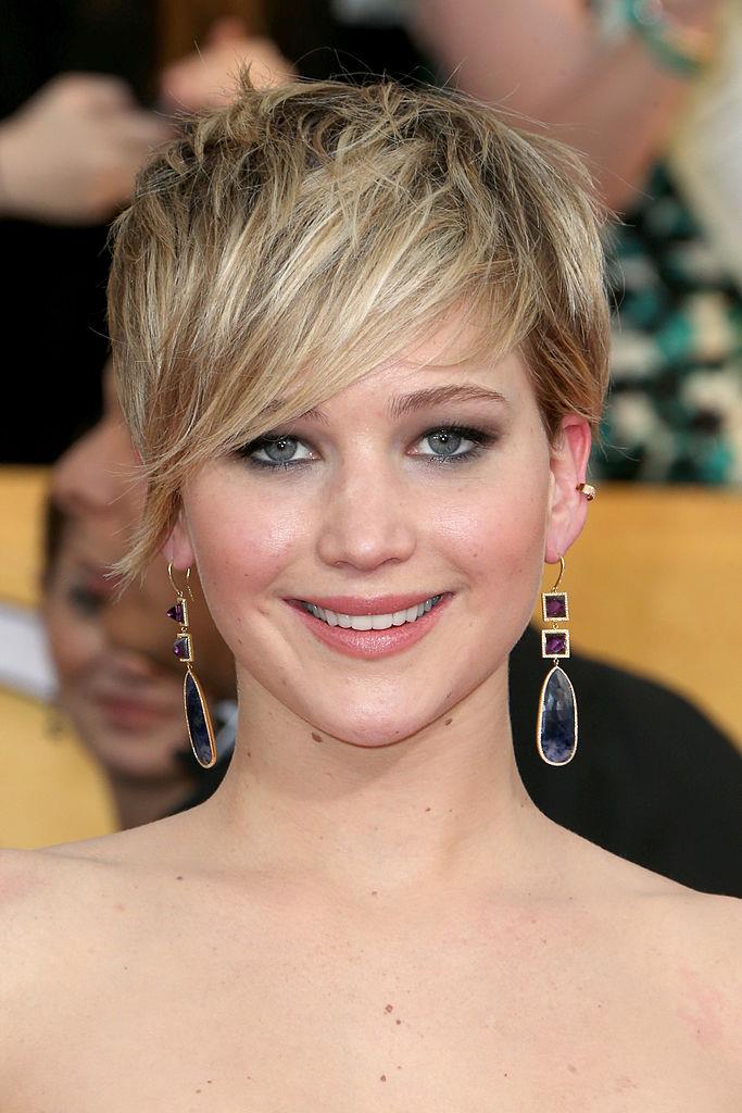 **Jennifer Lawrence's pixie cut:** The actress rose to fame with long, blonde waves, so when she cut them all off in 2013 it caused some controversy from more conservative members of society. Jen's explanation for the bold cut? "It grew to an awkward, gross length, and I kept putting it back in a bun and I was like, "I don't want to do this," so I just cut it off.  It couldn't get any uglier."