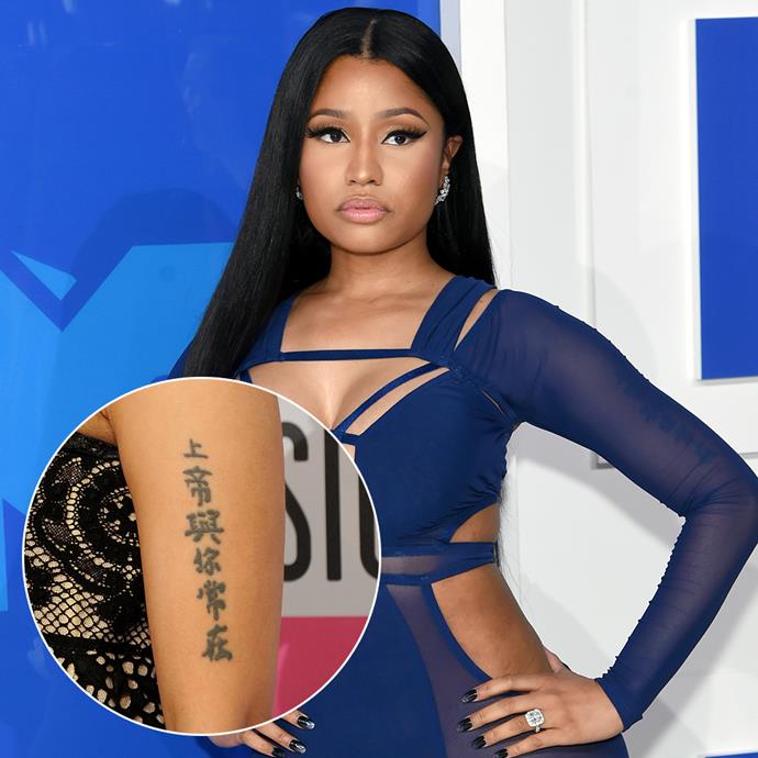 ***Nicki Minaj***<br><br>
Minaj got Chinese characters that said "God is with me always" on her arm when she was 16, which she regrets. "Way too young. You have no idea what you want to put on your body at the age of 16," she said in an interview. "You need to wait until at least 21 and decide."